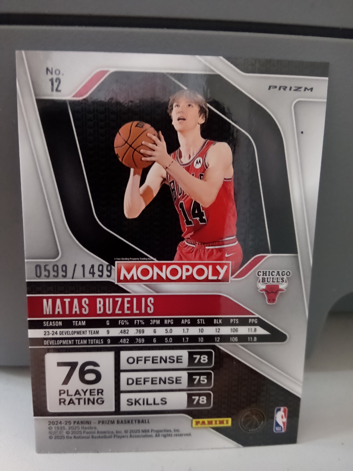 2024-25 Panini Prizm Monopoly * Matas Buzelis * #0599/1499 Orange Icons RC #12